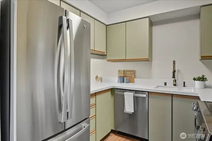Some objects may appear larger than in "real life!" Enjoy your brand new double door refrigerator and freezer.