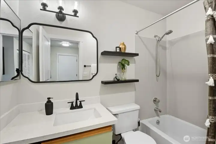 Second full bathroom off the hallway. A rare find for a condo!
