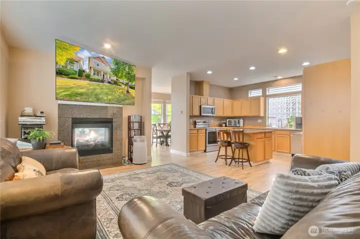 Family room has double sided fireplace