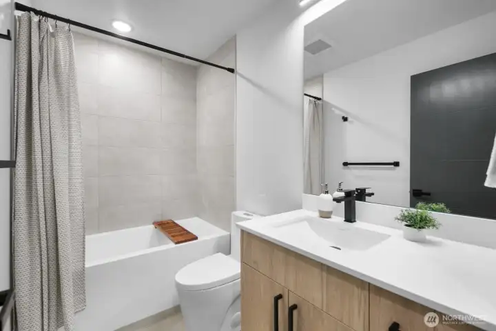 Photos are of model home 828B. Layout and finishes may vary.