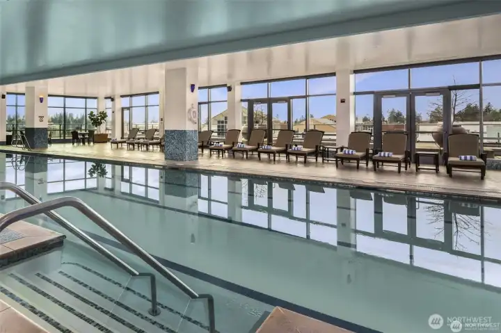 Indoor pool with spa-style ambiance.
