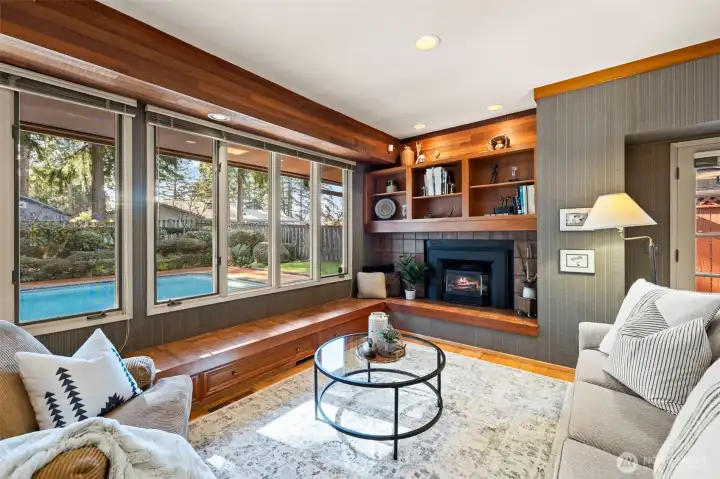 Game room looks out onto the large deck and pool