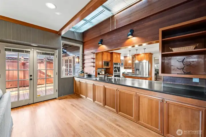 Opening to kitchen. Plenty of built-in storage