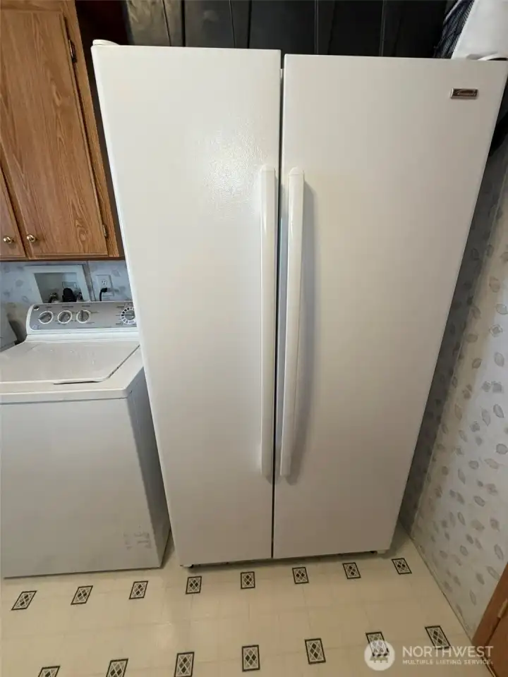 Washer/Dryer  Extra refrigerator included