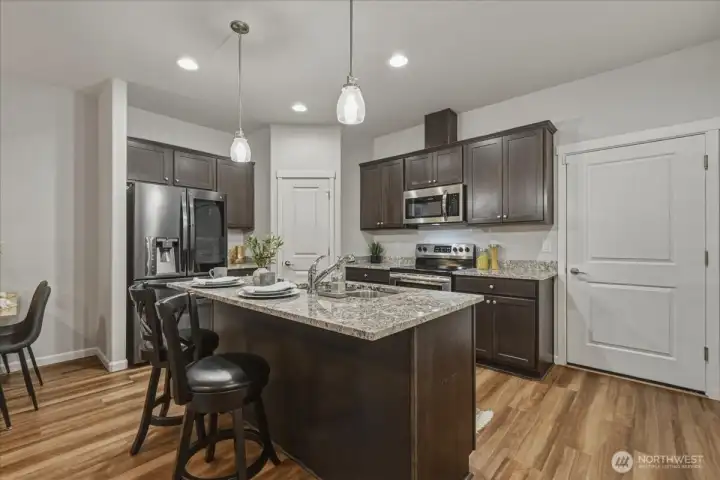 Kitchen, Granite Counters, Island, Eat Bar, Luxury Vinyl Plank Flooring, High Ceilings