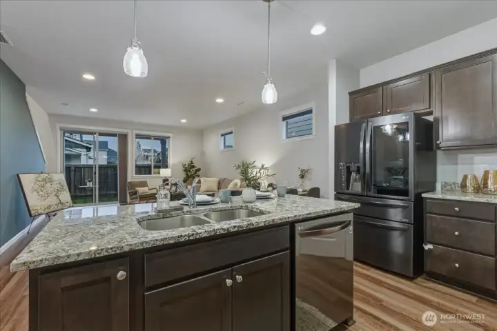 Kitchen, Island, Eat Bar, Luxury Vinyl Plank Flooring, High Ceilings, Free-Standing Fridge