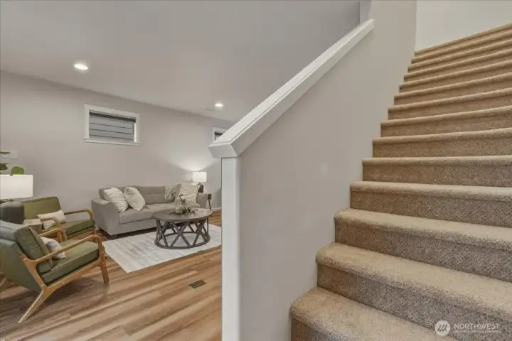 Main Level, Stairwell to Upper Level, Luxury Viny Plankn on Main, Carpet on Stairs