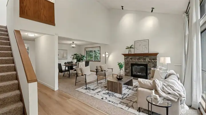 A welcoming layout with soaring ceilings, cozy living spaces, and seamless flow into the dining area—perfect for both everyday living and entertaining.