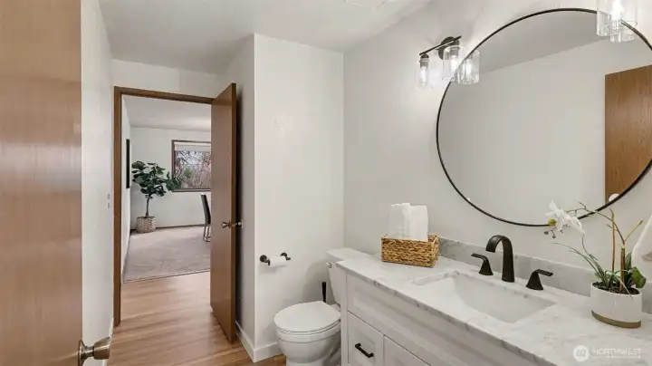 A beautifully updated Jack & Jill bath offering both style and convenience with direct access from adjacent spaces.
