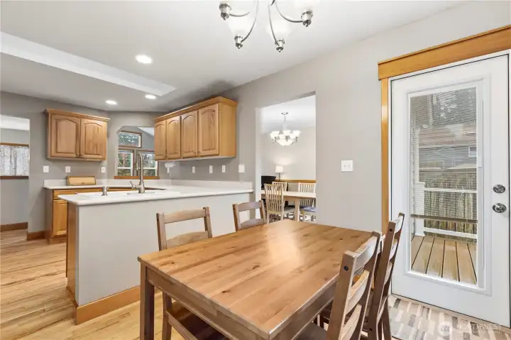 Eating area in kitchen with access to back deck