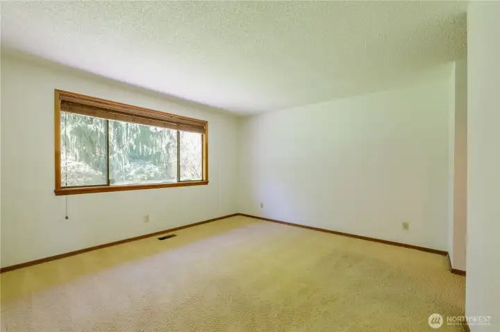 Bedrooms are off in their own wing of the home.
