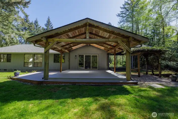 Covered and uncovered decks - truly an outdoor space for dining and lounging with space for a hot tub too!