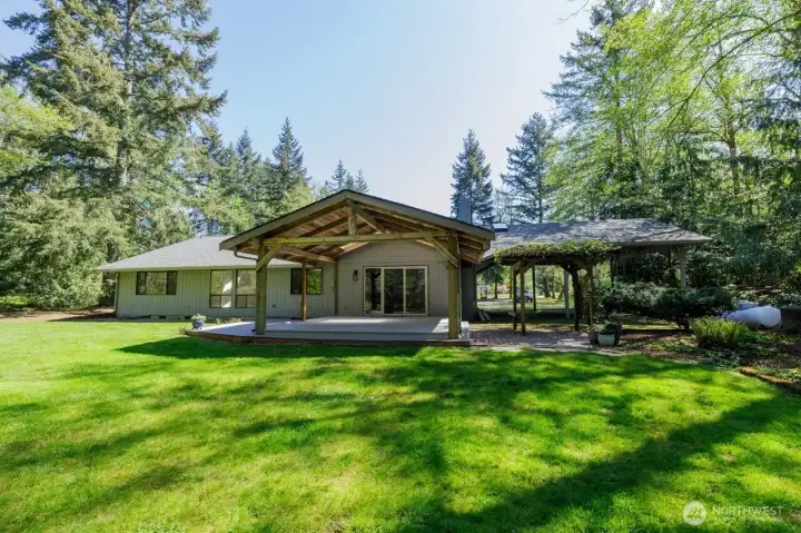 Big back yard that just doesn't quit - space for play, space for gardens, space to decompress and enjoy the quiet.
