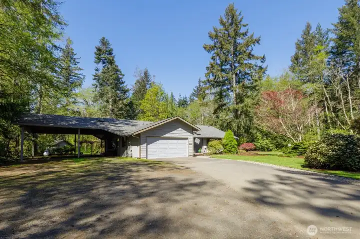 Double garage and a three bay carport...