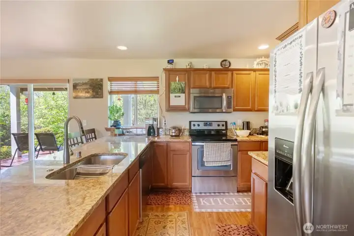 Kitchen with Granite Counters & Stainless Applianes