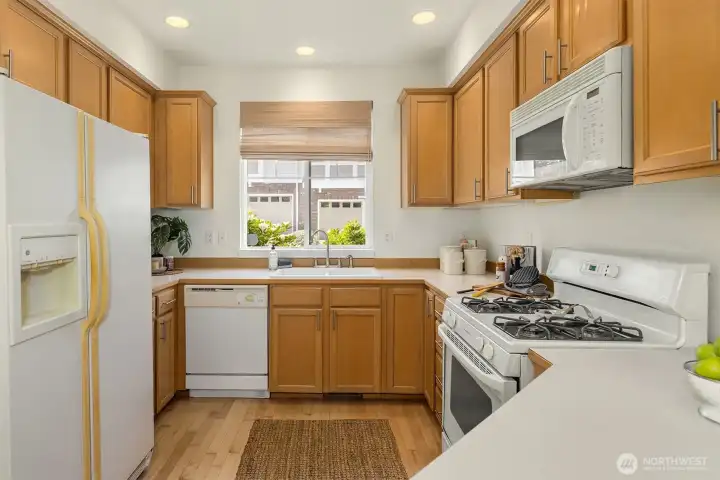 There is also a pantry in addition to the cupboards and drawers you see here. Having a place for all your kitchen gadgets is a real benefit.