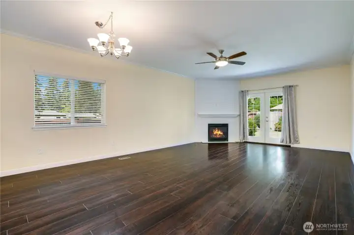 Large family room with gas fireplace.