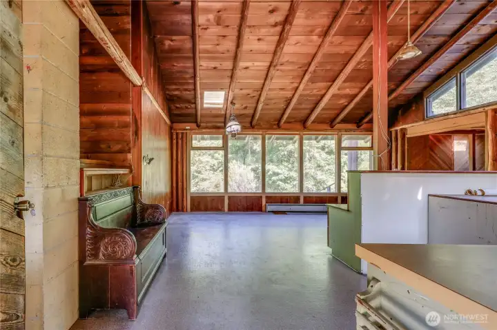 From the front door, facing the kitchen/dining area