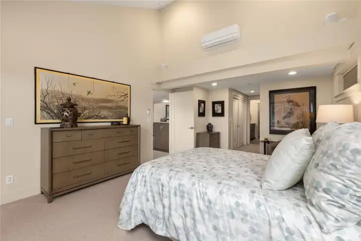 The suite features double closets, one is a walk-in (not shown)