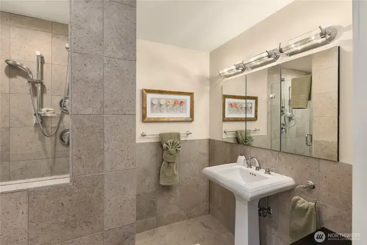Upstairs guest bathroom with zero-entry shower