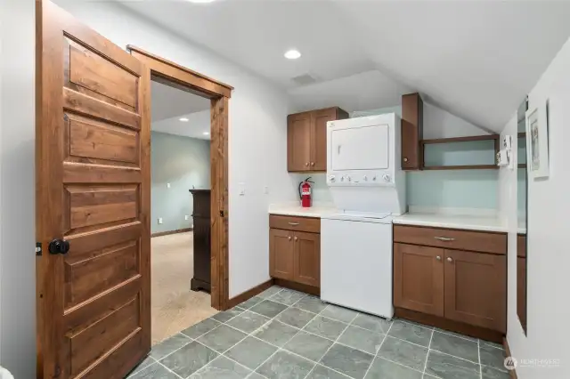 A convenient upstairs laundry room is just off of the master. Features extra storage space, and the Safe stays.