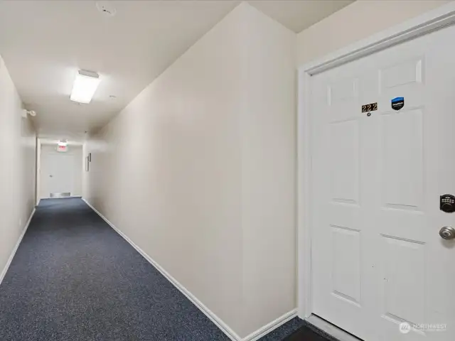 Secured lobby door lets you into this  well-kept building where you will find unit  222 on the second floor.