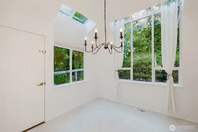 Breakfast nook with access door to side of house