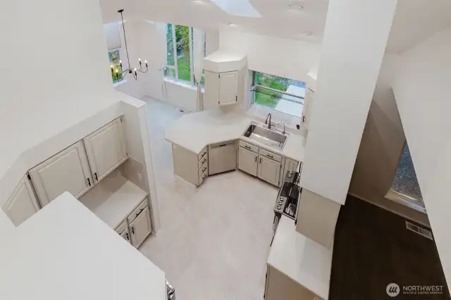 Staircase overlooks kitchen and formal Living Room