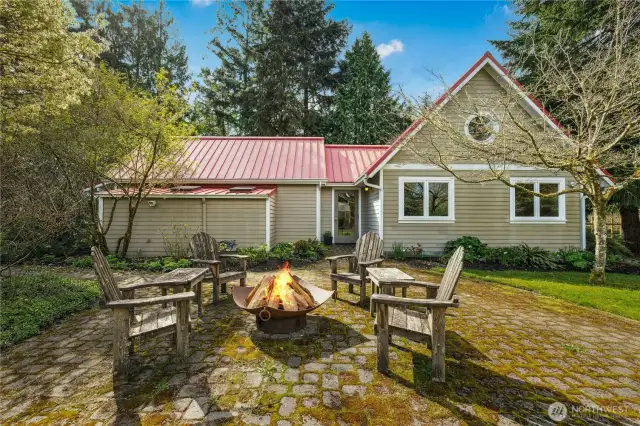 Enjoy Evenings Around the Fire Pit Adjacent to Guest House