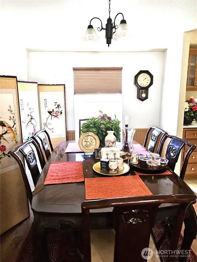 Spacious separate dining room opens into the living room.