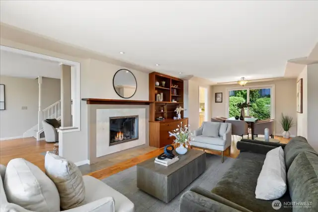 Gas fireplace #1; gorgeous custom mantel, bookshelves and built-ins