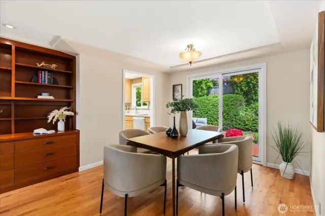 Dining space with access to back yard and patio