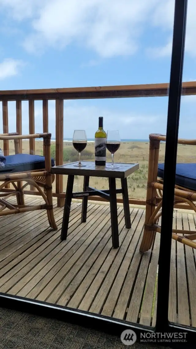 Relax on your private deck with a view of the dunes and the ocean.  It doesn't get better than this!