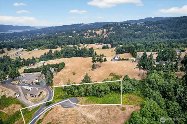 Property lines drawn on photos are approximate.