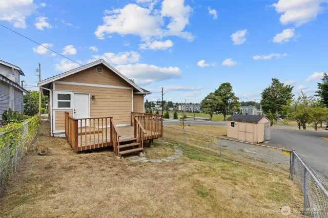 Bid deck in the back with a fully fenced portion perfect for pets.