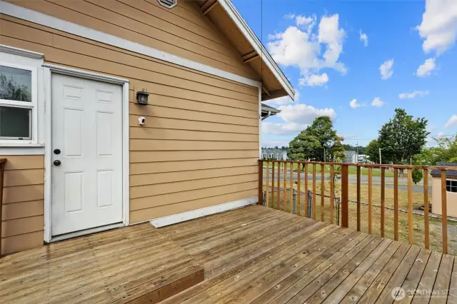 Bid deck in the back with a fully fenced portion perfect for pets.