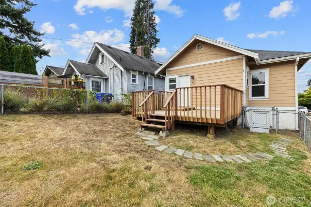 Bid deck in the back with a fully fenced portion perfect for pets.