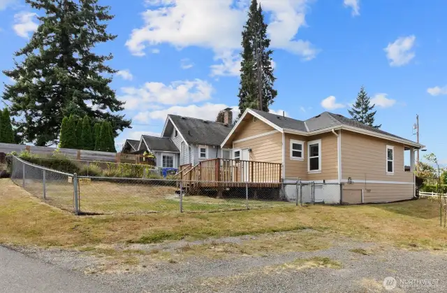 Bid deck in the back with a fully fenced portion perfect for pets.