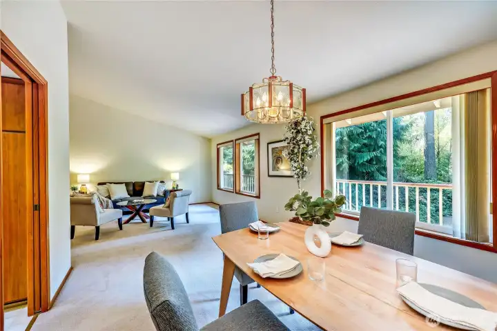 Large windows open for fresh air.  Nice dining area with the entrance to the kitchen to the left.