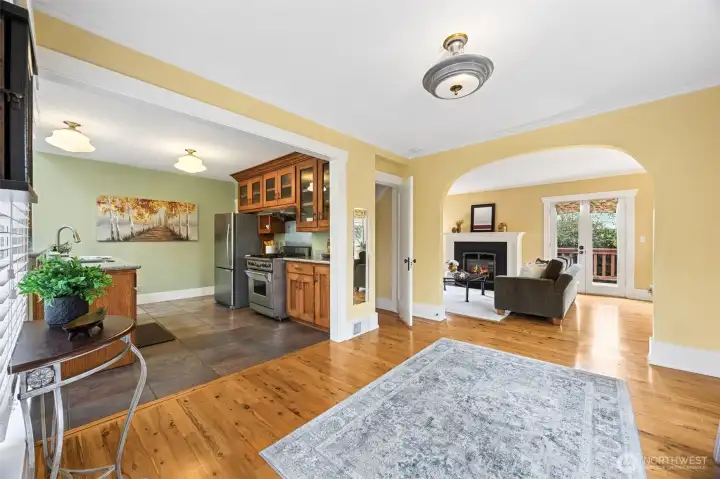 The open floor plan flows easily from entry to living, dining and kitchen spaces!