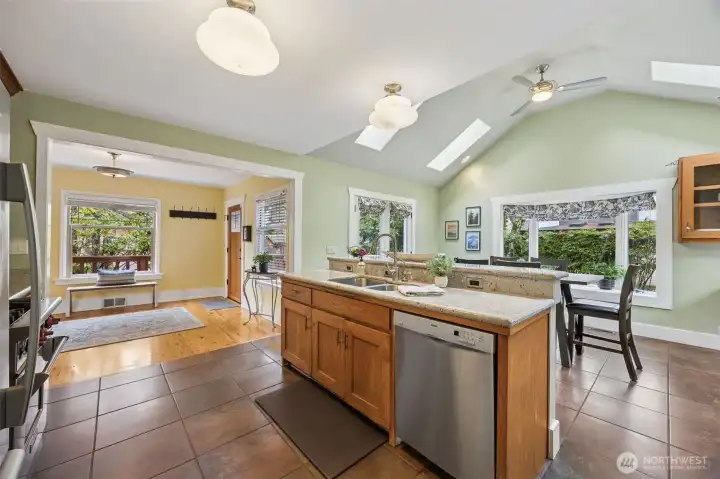 With ample windows, skylights and vaulted ceilings, the kitchen and dining spaces are light & bright!