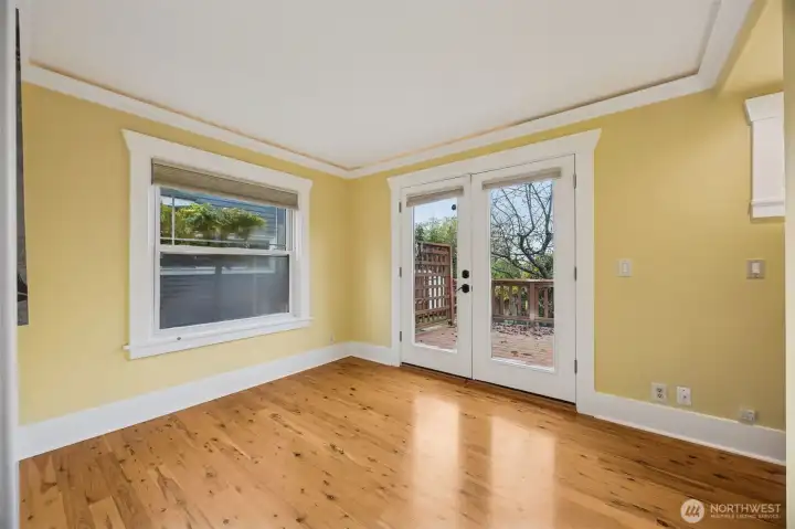 This main floor bedroom opens out onto the back deck.