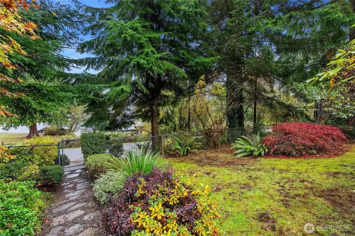 looking from the front door and deck, a private sanctuary awaits.