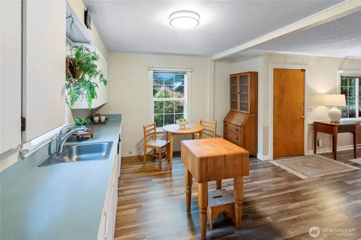 back door looking through the kitchen to the front door.