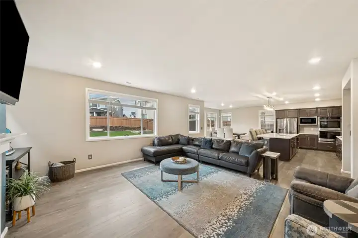 Great room with dining & kitchen in view