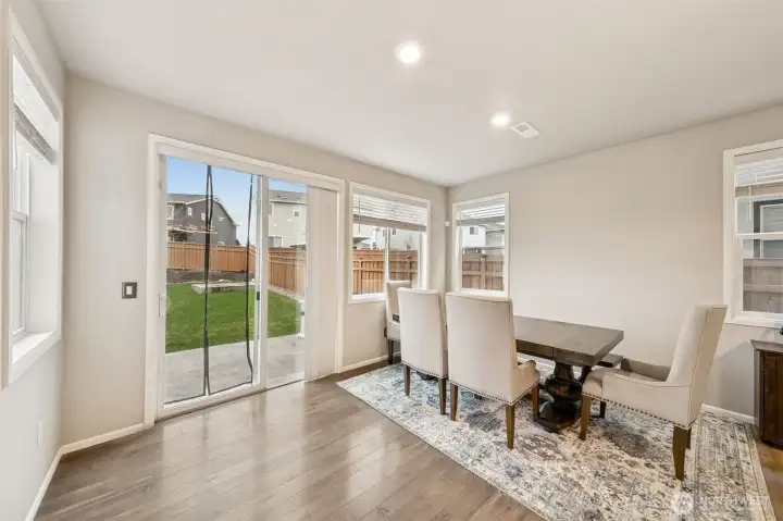 Large dining with tons of natural light