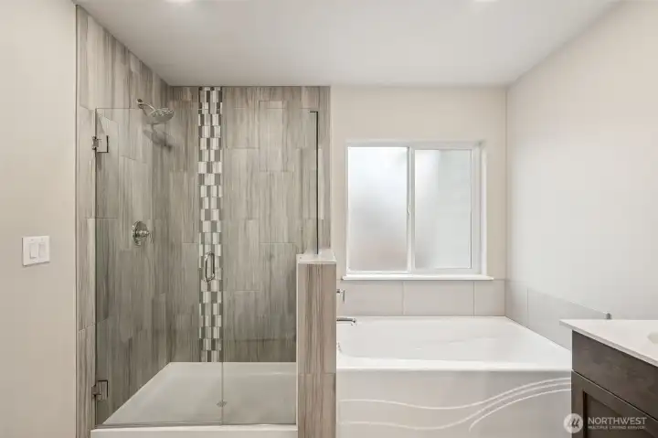 Frameless glass shower in Primary Suite