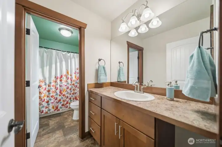 Upper full guest bath.