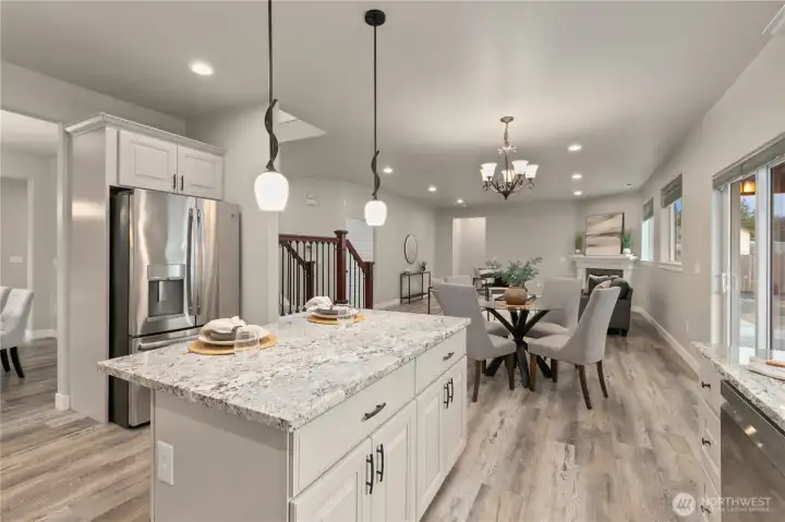 Kitchen opens to the generous family room