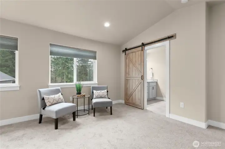 Sitting area, vaulted ceilings and oversized windows